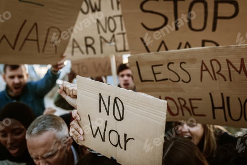Preview: Group of activist people marching for world peace.