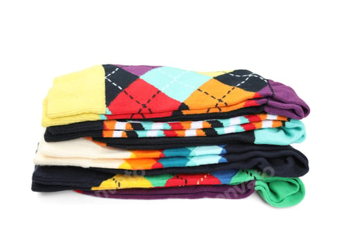 Preview: Many new colorful socks on white background