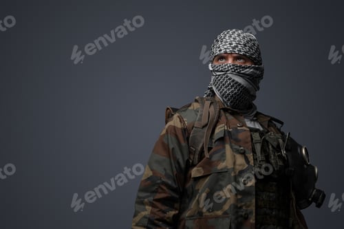 Preview: Middle eastern militant, camouflage uniform on gray background