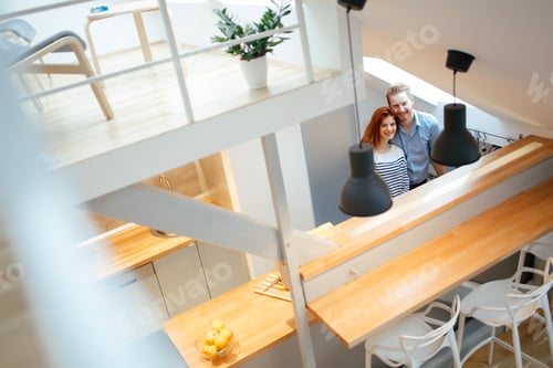 Aperçu: Beautiful couple in well designed kitchen