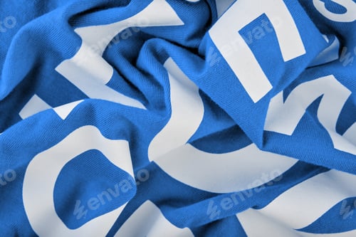 Preview: Cotton Knitted Fabric. Texture Of A Blue Fabric With A White Print.