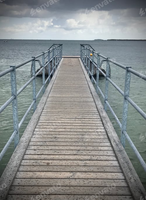 Preview: Long wooden pier going out to the horizon