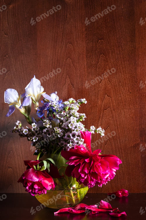 Preview: various flowers in vase on dark brown background