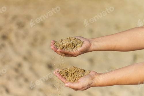 Preview: Selective focus shot of hands holding sand, Barceloneta Beach, Barcelona, Spain