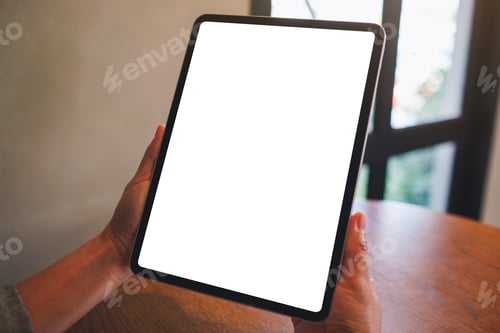 Preview: Mockup image of a woman holding digital tablet with blank white desktop screen