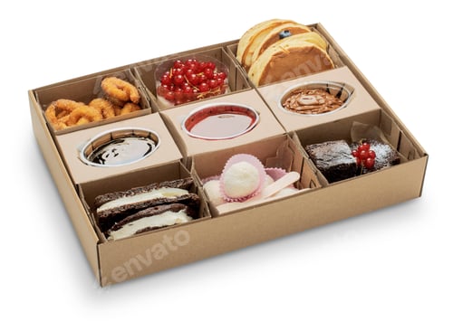 Preview: Assortment of confectionery products with berries to a container for home delivery on request