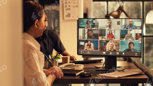 Vista previa: Executive manager attending corporate videocall meeting with webcam