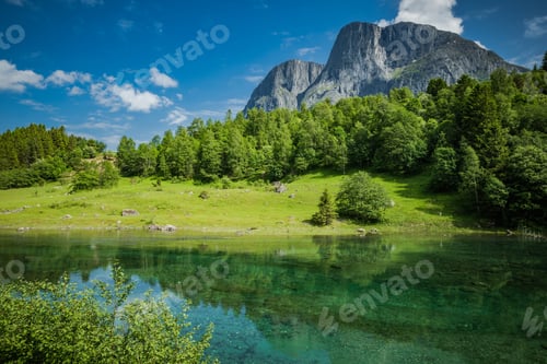 Preview: Picturesque Sunny Landscape with Clear River Water, Mountains and the Forest.