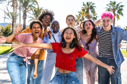 Preview: Multiethnic group of young happy friends hanging out