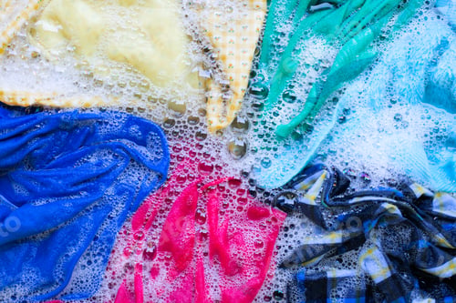 Preview: Washing clothes, colorful clothes soaked.