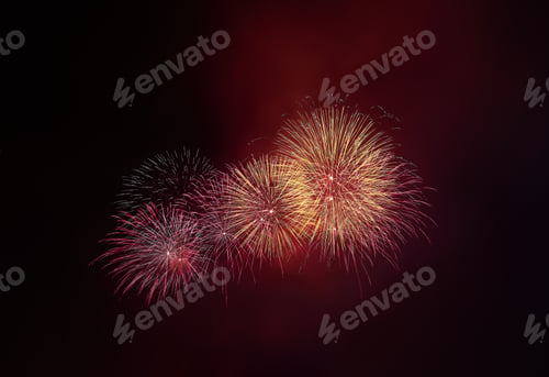 Preview: Colorful beautiful fireworks salute against the dark night sky. Abstarct pattern of salute