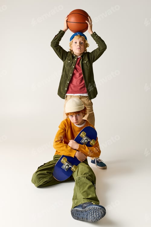 Preview: Stylish young boys embodying school spirit while playing and having fun together