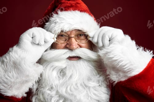 Preview: Close up of Santa Claus on the red background