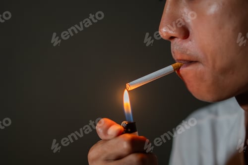 Preview: Person lighting a cigarette with a lighter