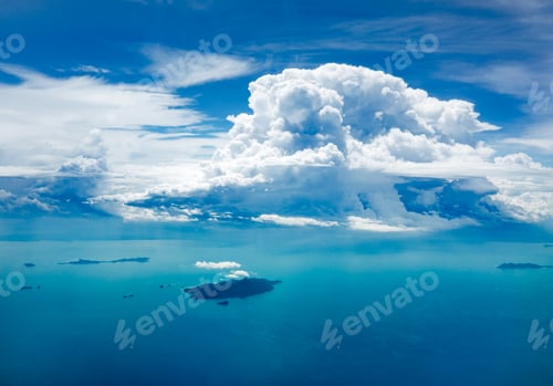 Preview: Cloud and ocean with island, aerial view