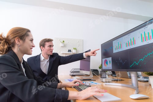 Preview: Efficient teamwork modern office setting showcases woman and man collaborating data analysis