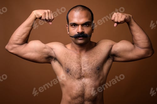 Preview: Portrait of muscular Indian man with mustache shirtless