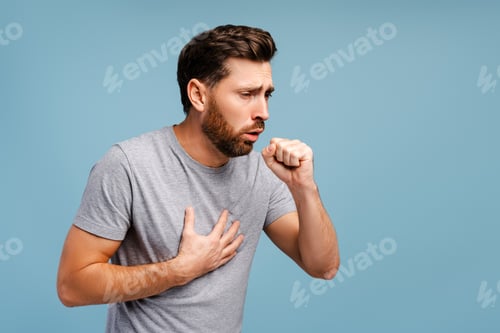 Preview: Portrait of sick, upset Hispanic man cough, having virus, cold. Treatment, health care concept