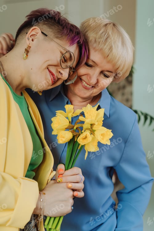 Preview: Celebrating Mother's Birthday: Daughter's Loving Gesture with Flowers