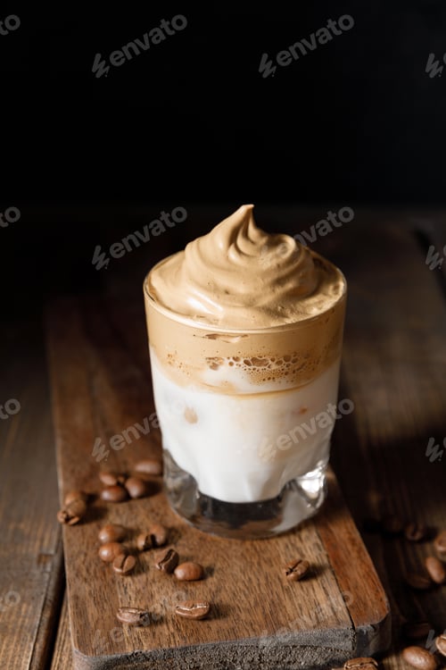 Preview: Dalgona coffee - the Korean coffee drink on wooden background.