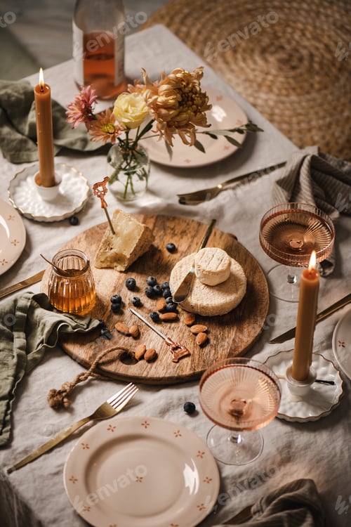 Preview: Rose wine and appetizers for festive romantic dinner table setting
