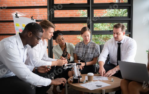 Preview: Group of diverse business people working together in the office,