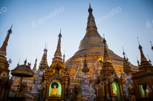 Preview: Exterior view of Buddhist pagoda with gilded stupa.