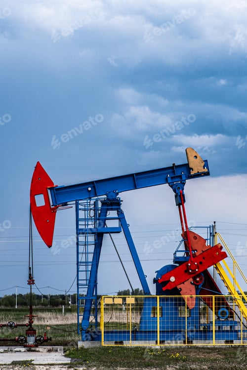 Preview: Oil drilling derrick pumps oil from ground. Petroleum industry, crude oil extraction.