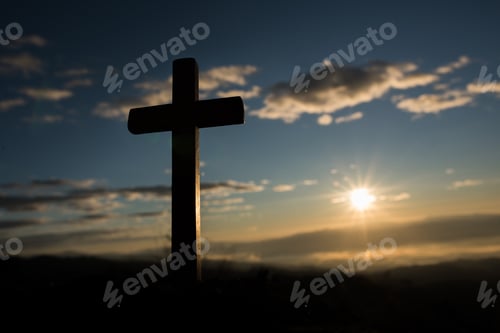 Preview: Silhouette of catholic cross and sunrise