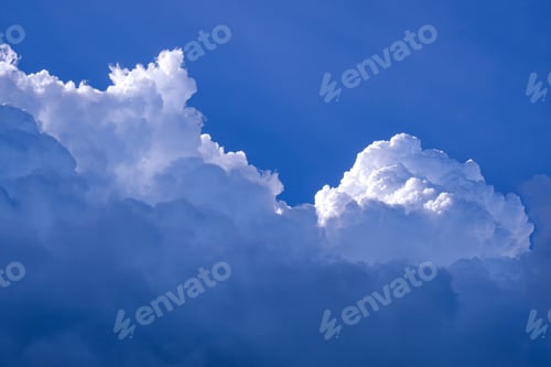 Preview: Dramatic light and dark blue Nimbostratus with white Cumulonimbus clouds on sky background