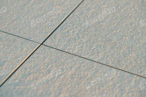 Preview: Large square stone paving tiles, hollow joints, close-up