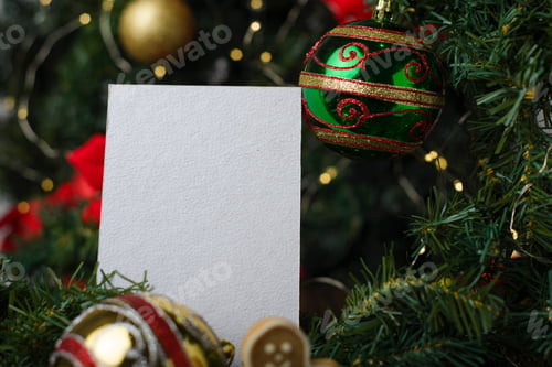 Preview: Gift card or Christmas greeting card or commemorative moment on a table with Christmas decorations