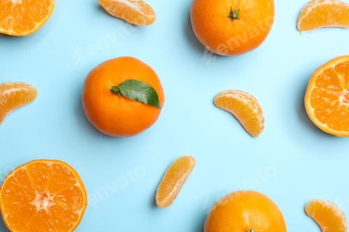 Preview: Composition with tangerines on color background, flat lay
