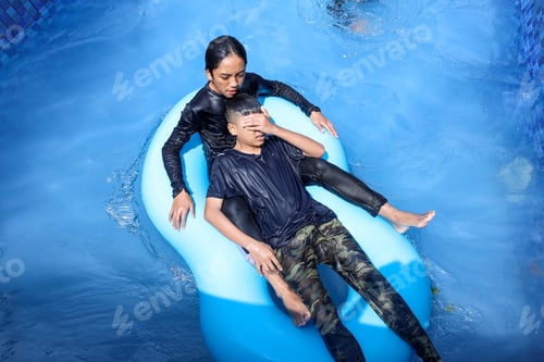 Preview: Boys enjoying summer time in swimming pool