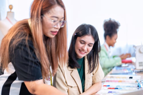 Preview: Senior fashion designer teamwork discuss teach learner final design share idea in shop lady tailor