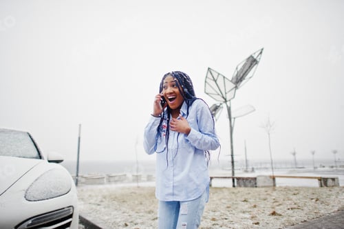 Preview: Stylish african american girl with dreads