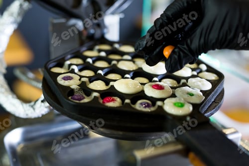 Preview: Waffle iron in the kitchen at shop. Preparing Hong Kong waffle