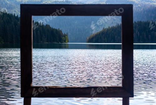 Preview: view through frame on beautiful glacial Black Lake in Montenegro