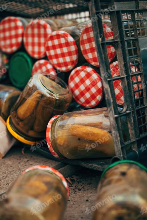 Preview: Expired homemade pickled cucumbers in jar thrown away