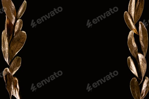 Preview: top view of borders made of golden decorative leaves isolated on black with copy space