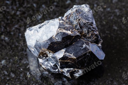 Preview: sample of unpolished andradite garnet on black