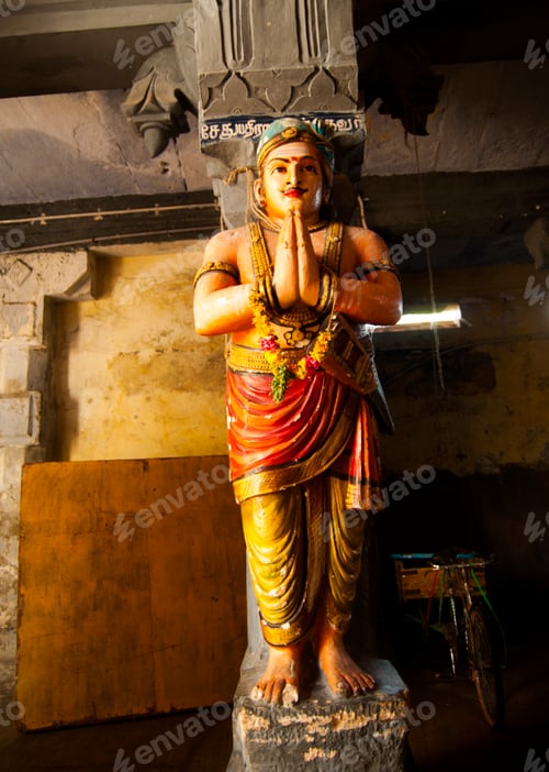 Preview: Spiritual stone statue of hindu god in ancient temple, India.