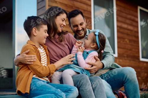 Preview: Happy parents spending a day with their kids outdoors.
