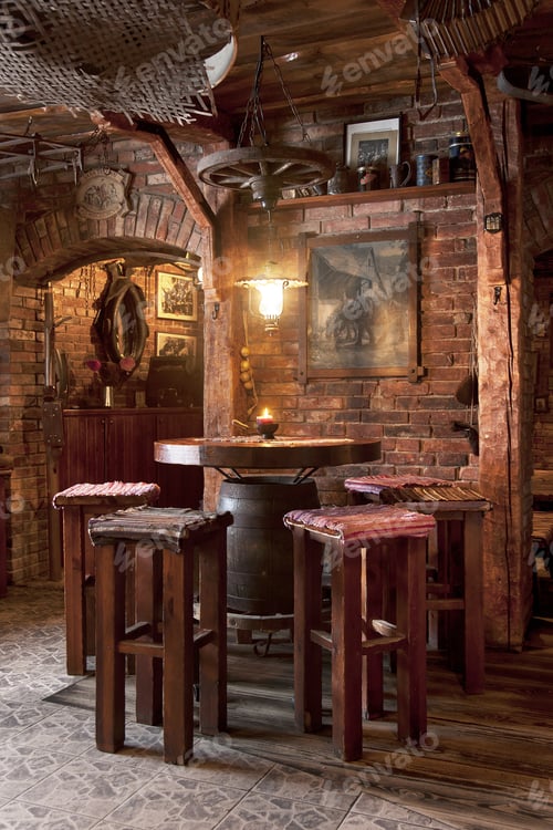 Preview: A hotel with old fashioned retro styled rooms, and rustic objects, bar table and stools.