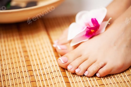 Preview: Beautiful legs of a woman with a fresh pedicure