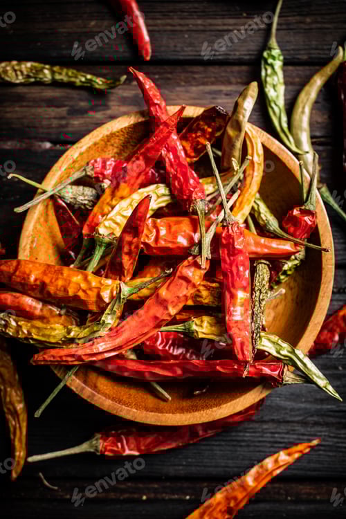 Preview: Red Dried Chili Peppers in Wood Bowl