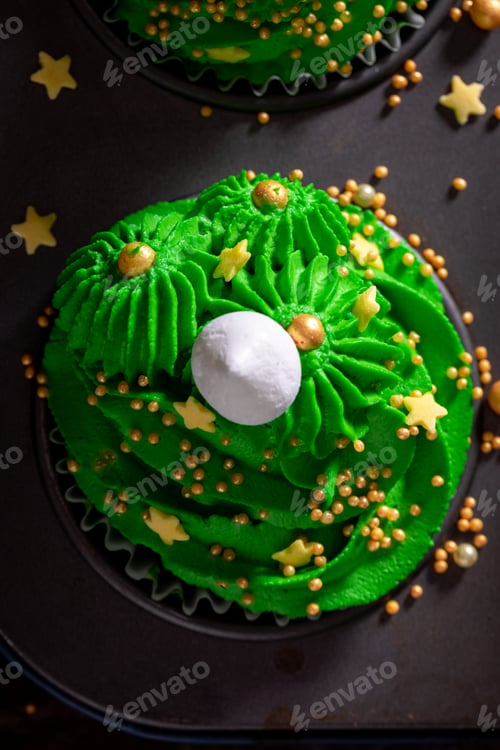 Preview: Beautiful green cupcakes with green flower shaped cream.