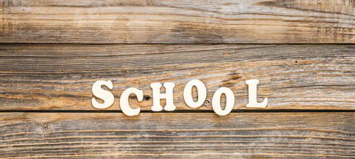 Preview: Back to school, banner with the inscription in wooden letters, top view.