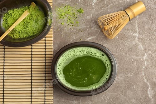 Preview: Flat lay composition with matcha tea on table