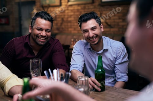 Preview: Two joyful men spending time in the pub